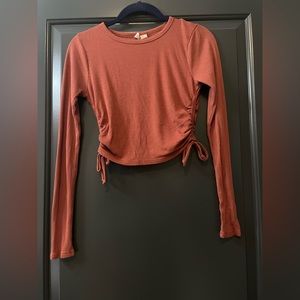 Orange top with cinching detail